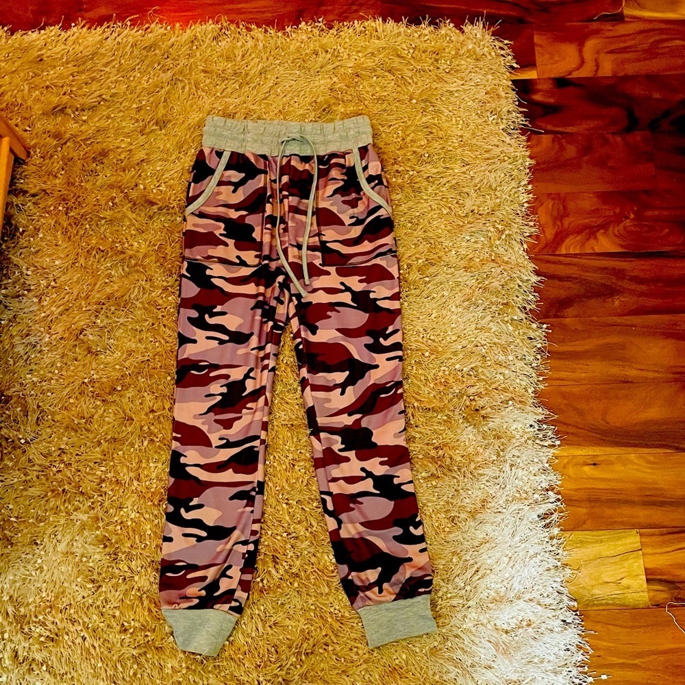Camouflage sweat/ lounge pants. Multi color: green,grey, tan, and black.